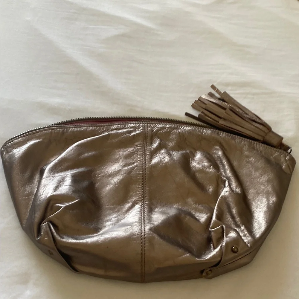 Jasper & Jeera Metallic Leather Clutch with Tassel